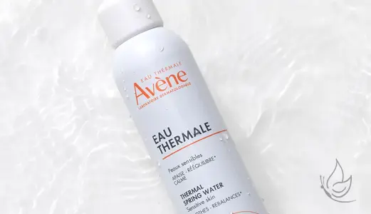 Avene Thermal Water Bottle on a water background